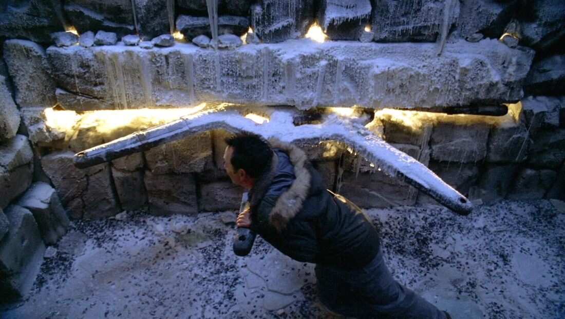 Benjamin Linus turns the frozen wheel.